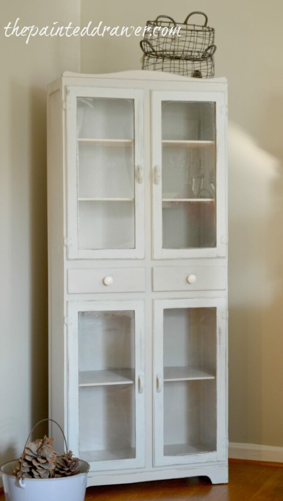 Farmhouse Cabinet www.thepainteddrawer.com