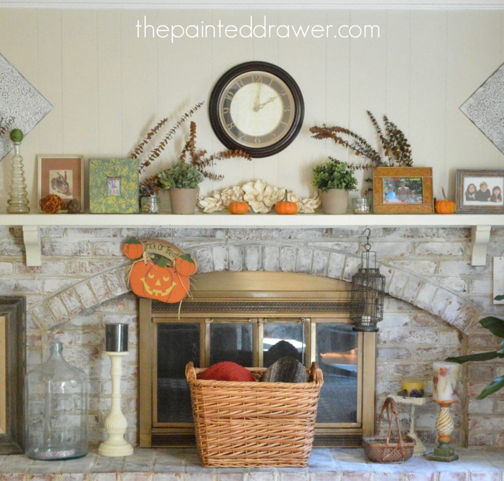 Whitewashed Brick Mantel www.thepainteddrawer.com