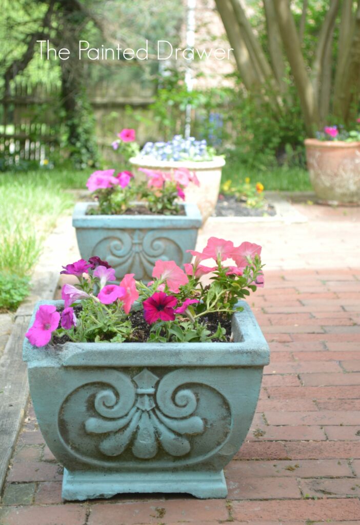Transforming Old Concrete Planters and a Feature!