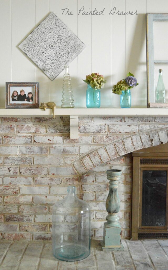 vintage window, vintage glass, Whitewashed Brick Hearth by www.thepainteddrawer.com Before and After on Blog, farmhouse room