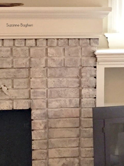 whitewashed brick fireplace