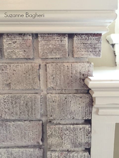 whitewashed brick fireplace